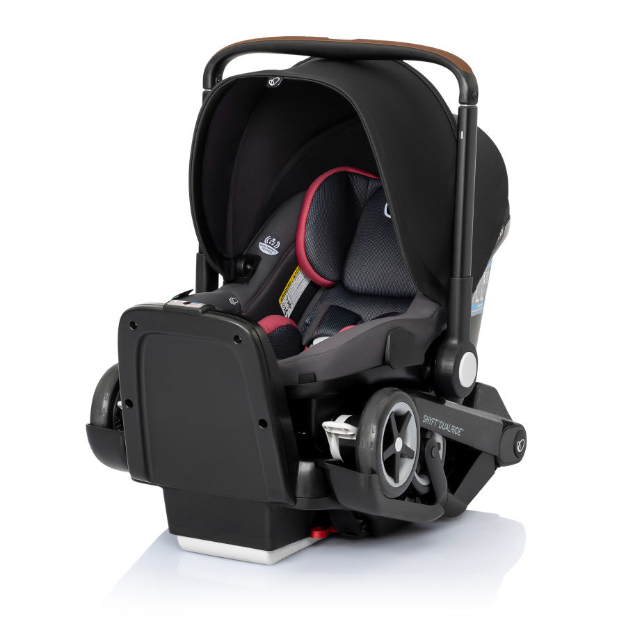 Pink car seat outlet stroller combo